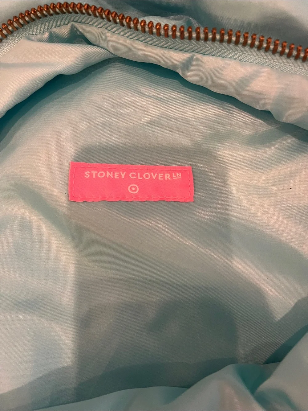Stoney Clover Lane Light Blue Backpack with Pink Logo Tag